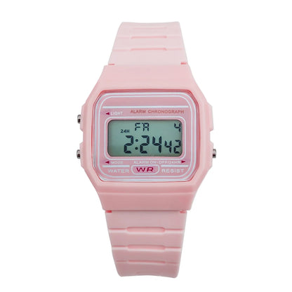 Pink digital watch on a white background