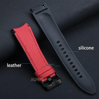 Red leather and black silicone watch strap on a textured surface