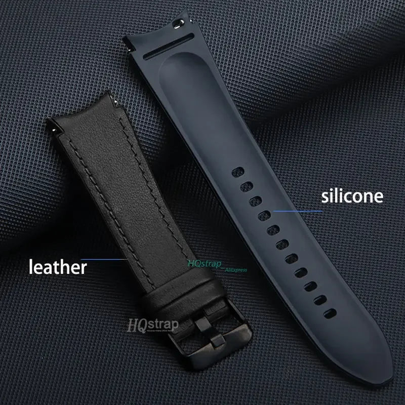 Black leather and silicone watch strap on a dark textured fabric background