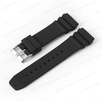 Black watch strap with silver buckle on a white background
