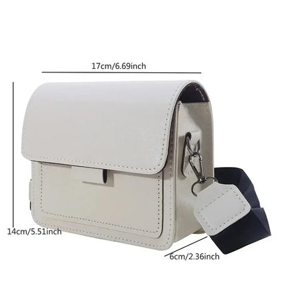 White handbag with measurements on a white background