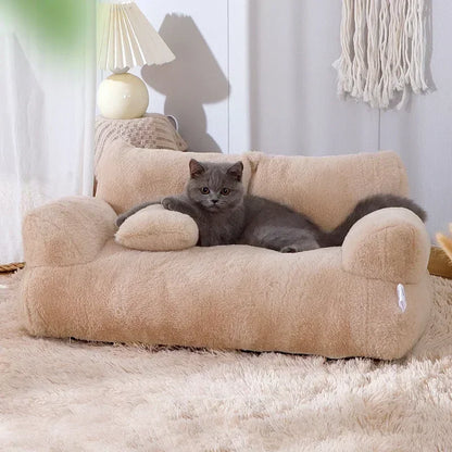 Cat lying on a plush beige pet bed in a cozy room.