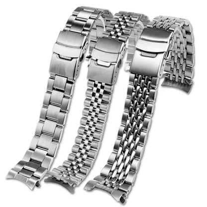Three silver metal watch bracelets on a white background