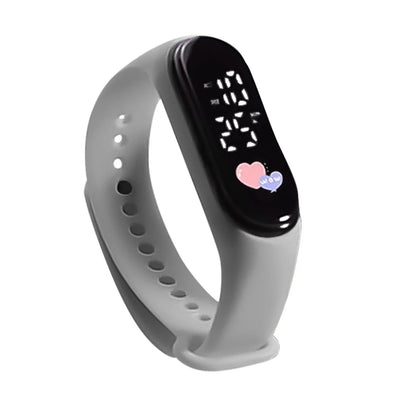 Gray smartwatch with a digital display on a white background