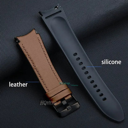 Two watch straps, one leather and one silicone, on a textured gray background.